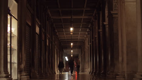 People-inside-ancient-building-at-St-Marks-Square-Venice-Italy