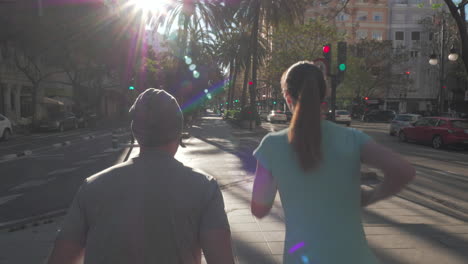 A-back-view-of-a-couple-jogging-on-a-beautiful-sunny-day