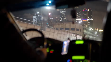 Illuminated-skyscrapers-in-night-Moscow-view-from-the-moving-car