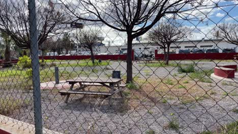 Closed-empty-garden-square-for-barbeque-within-the-city