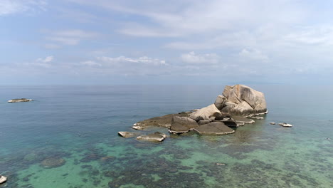 Flight-to-Majestic-Stone-Over-Coral-Lagoon