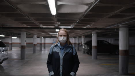 Woman-in-mask-in-underground-garage