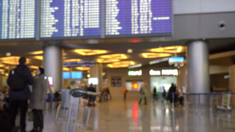 People-walking-in-airport-hall