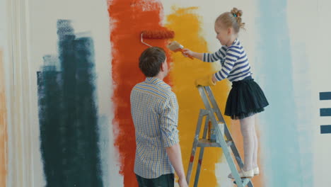 Father-and-Daughter-Painting-the-Wall