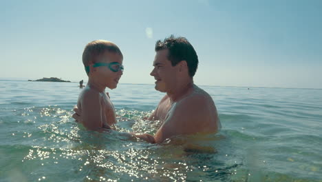 Enjoyable-sea-bathing-with-father