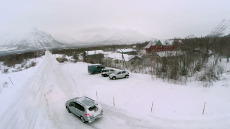 Car-Driving-out-the-Parking-and-Heading-to-Mountains