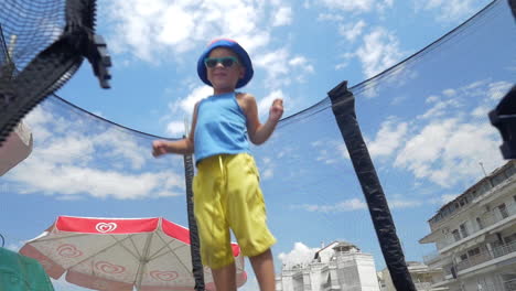 Little-child-having-fun-on-tramp-outdoor