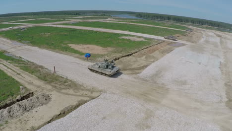 Aerial-shot-of-tanks-firing-targets-during-playwar