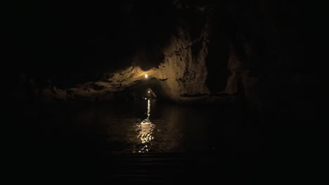 In-Halong-Bay-in-Hanoi-Vietnam-seen-river-and-dark-grotto