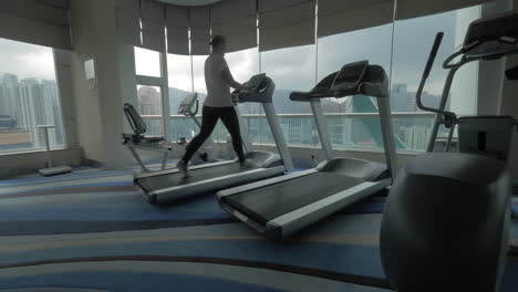 Woman-exercising-on-treadmill-in-the-gym