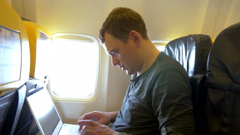 Busy-Man-on-the-Plane