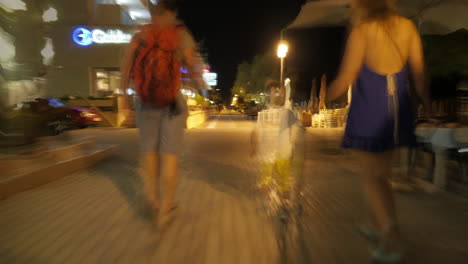 Hyperlapse-of-family-walking-in-night-street