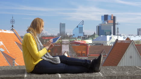 Girl-with-pad-and-city-panorama