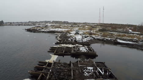 Flying-over-the-car-by-sea-with-unfinished-bridge