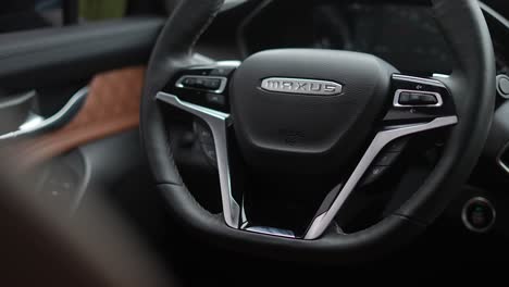 SUV,-modern-car-interior,-car-steering-wheel
