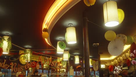 Bar-with-picturesque-colored-lamps-in-Paris