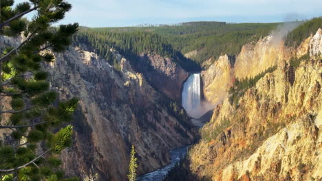 Artist-Point-Waterfalls-Grand-Canyon-of-the-Yellowstone-National-Park-river-Upper-lower-Falls-lookout-autumn-Canyon-Village-stunning-early-morning-first-light-landscape-tree-cinematic-slide-right