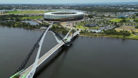 Aerial-drone-view-orbiting-left-looking-over-the-Matagarup-Bridge-in-Perth,-WA