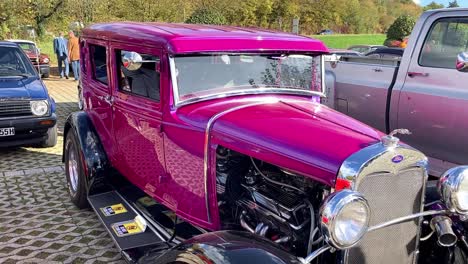 Pink-vintage-car-on-vintage-car-meeting-at-Hofmeister-in-Bietigheim,-South-of-Germany