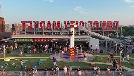 Aerial-view-of-Ponce-City-Market-rooftop-amusement-park-with-people-enjoying-the-evening