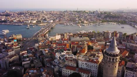 Boat-traffic-on-Golden-Horn,-Galata-Tower-in-foreground,-Istanbul