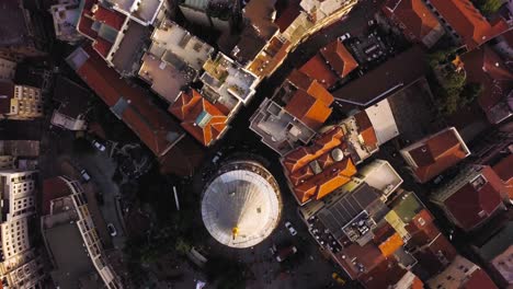 Aerial-birdseye-forward-shot-of-Beyoglu-district-passing-over-Galata-tower