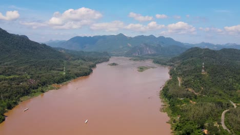 Aerial-View-Of-The-Great-Mekong-River-Cutting-Through-Tropical-Jungle-Landscape-Of-Luang-Prabang
