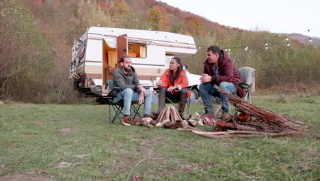 Bearded-friend-telling-a-story-to-his-couple-friends