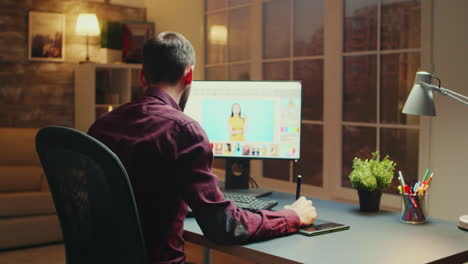 Professional-photographer-sitting-at-his-desk