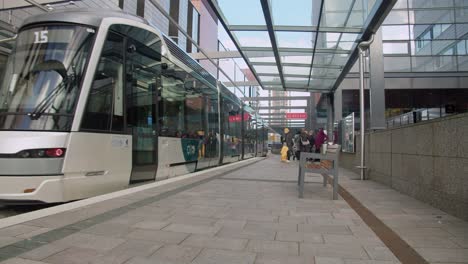 Clean-and-tidy-transit-train-at-street-platform-in-Nordic-Helsinki-FIN