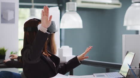 CAD-expert-working-with-virtual-reality-glasses-in-office