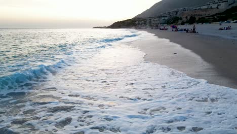 Waves-crashing-on-the-shore-of-a-beautiful-beach-in-Albania-during-sunset