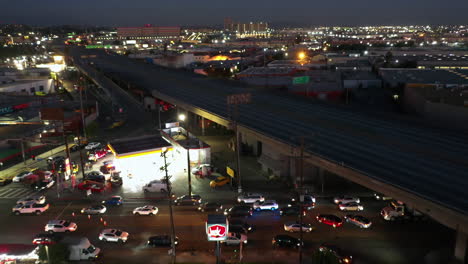 Aerial-view-over-traffic,-toward-the-damaged-Santa-Monica-freeway-I-10-in-Los-Angeles