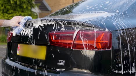 Washing-black-car-trunk-boot
