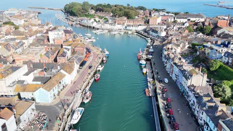 Weymouth-Harbour-Dorset-UK-pull-back-drone-aerial-reverse-reveal