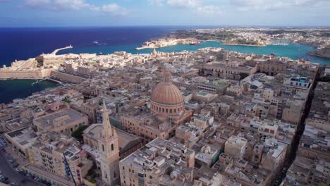 Descending-Orbit-Centred-on-Valletta-Dome-Cathedral,-Malta
