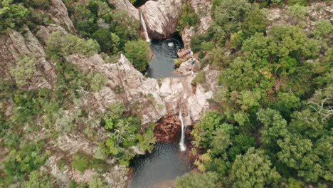Waterfalls,-basins,-cascade,-people-jumping-and-swimming,-Corsica,-Drone,-Aerial