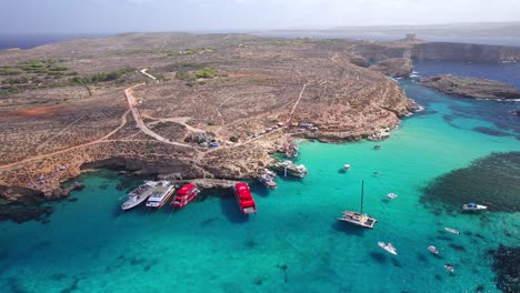 Wide-Aerial-Landscape-of-Blue-Lagoon-on-Comino-Island,-Malta