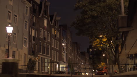 Viewing-night-Amsterdam-from-sailing-boat