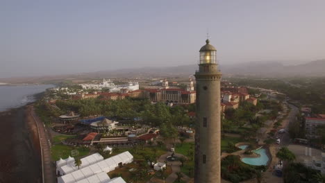 Aerial-scene-of-tourist-town-and-lighthouse-Maspalomas-Gran-Canaria