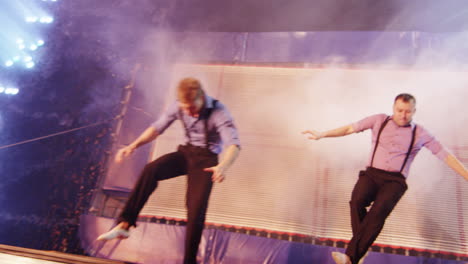 Men-performing-on-trampoline-in-the-circus