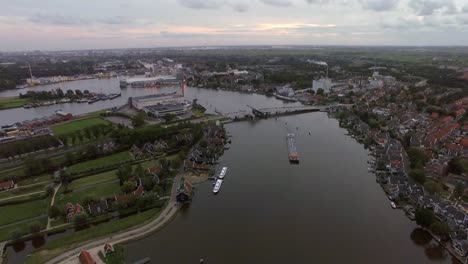 Aerial-scene-of-town-and-river-in-Netherlands