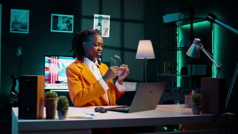 African-american-student-working-on-her-bachelor-paper-essay-at-home