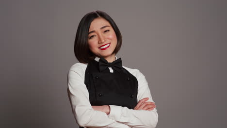 Restaurant-hostess-posing-with-confidence-in-studio