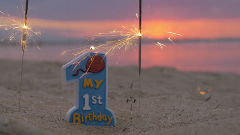 One-year-old-baby-boy-birthday-candle-on-the-beach