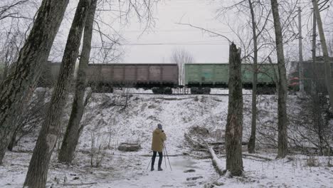 Creating-footage-of-passing-freight-train-in-winter