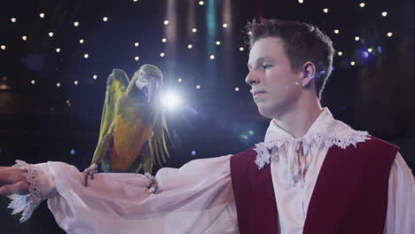 Circus-tamer-and-his-macaw