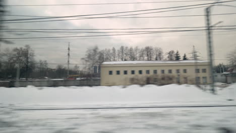 Timelapse-of-train-travel-through-winter-city