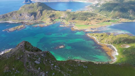Lofoten-Islands-Panorama-Viewpoint-on-top-of-a-mountain-in-Norway,-Scandinavia---Aerial-Tilting-Up