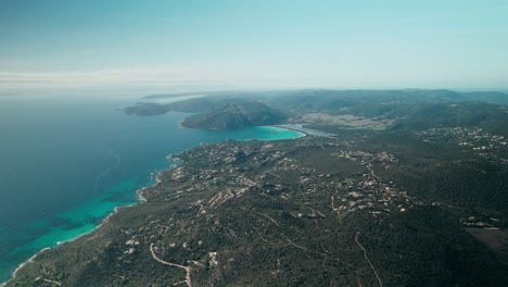 high-altitude-aerial,-drone-footage,-coastline-panorama,-Corsica